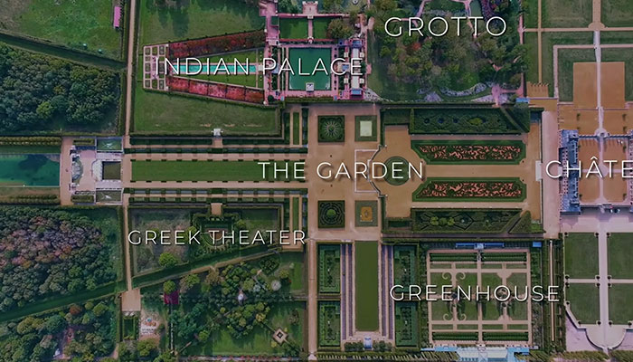 Vista aérea de la casa más cara del mundo que muestra su lujoso jardín, el palacio indio, la gruta y las áreas de invernadero.