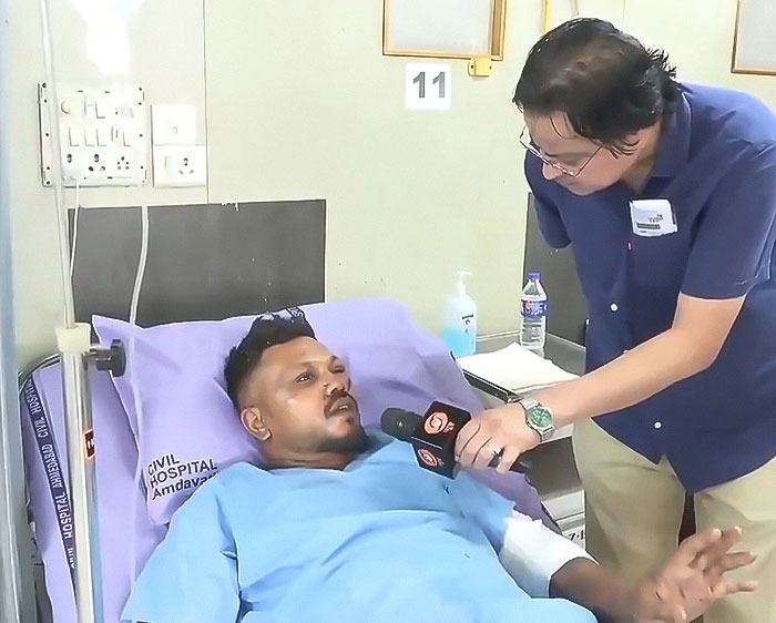 El actor tailandés que sobrevivió a un accidente aéreo dando una entrevista desde la cama del hospital sobre el enlace misterioso con el único sobreviviente de Air India.