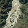 Esta es una imagen satelital recopilada el 13 de noviembre de 2012, de la mina Maoniuping, una de las minas de elementos de tierras raras más grandes de China, ubicada cerca de Mianning, provincia de Sichuan, China.