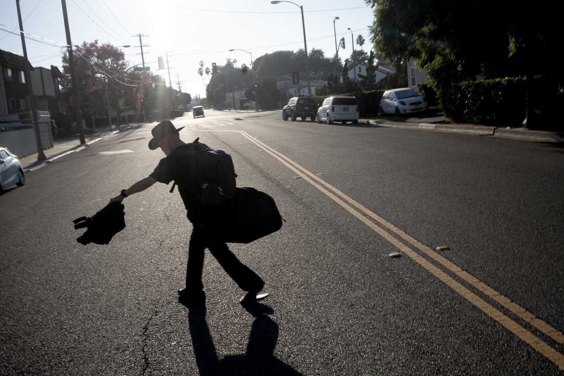 UNITED STATES, LA - Marcel Campos, lead singer of Spaghetti Cumbia, heads off to a show from his home in Alhambra, Los Angeles on November 3, 2023. The band Spaghetti Cumbia created their own sub-genre by combining cumbia with western styles and rock ’n roll. They grew up on the east side of Los Angeles when gang violence plagued the area; the members turned to music as an alternative path. Now, they rock clubs, while keeping day jobs to support their families.
