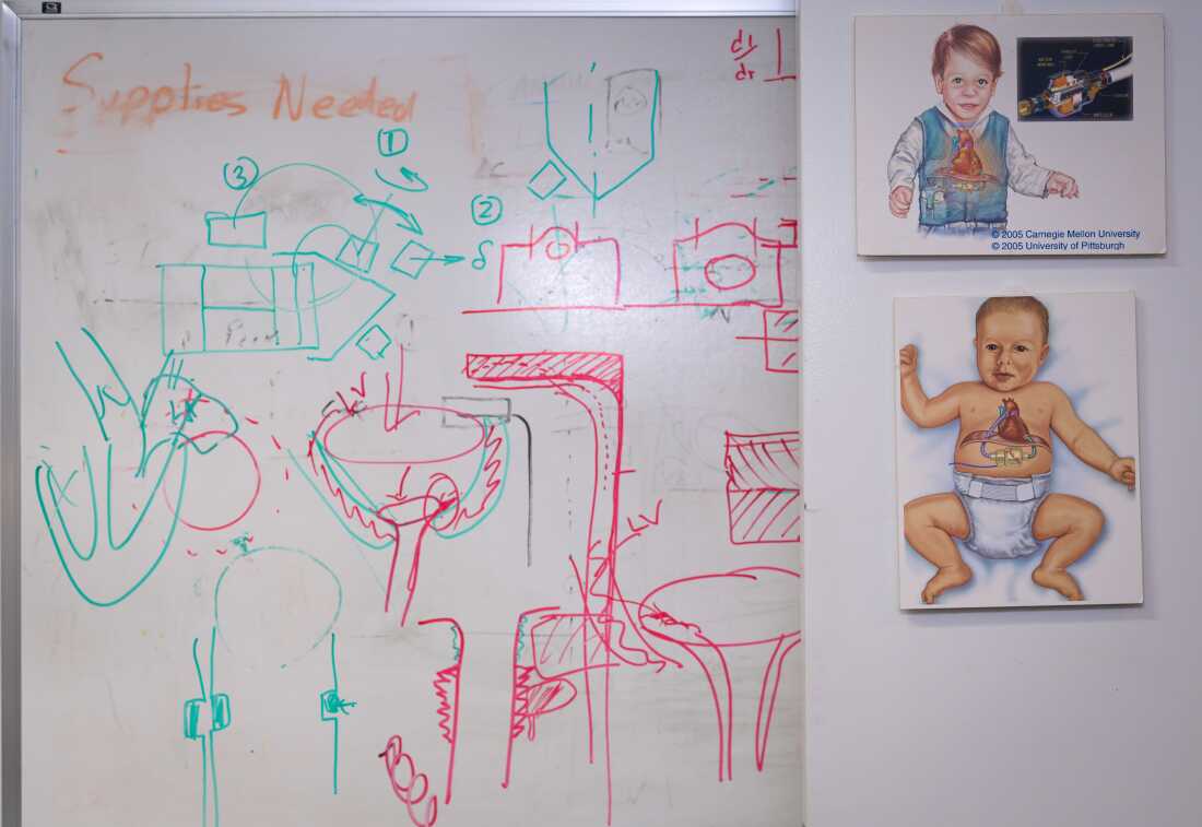 A whiteboard in Antaki's lab at Cornell University. It has schematic marker drawings on it. 