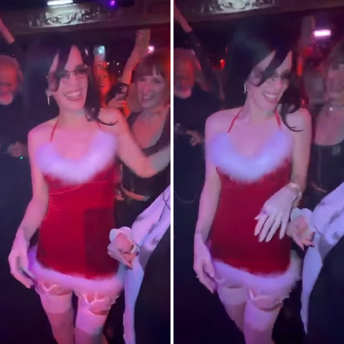 Lily Allen en una animada fiesta que celebra el divorcio continuo, sonriendo y vestida con un traje festivo rojo y blanco.