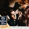Un cartel de la película de 1944, Gaslight, protagonizada por Ingrid Bergman y Charles Boyer. Bergman apunta con un cuchillo a la cara de Boyer y está atado a una silla.